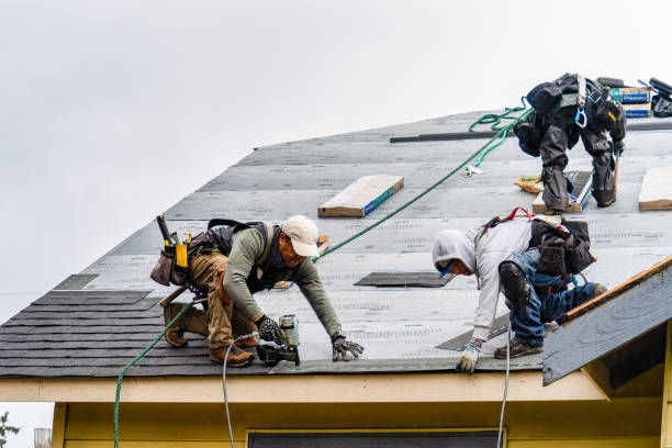 Professional Emergency Roof Repair technician working in Port Jefferson Station, NY